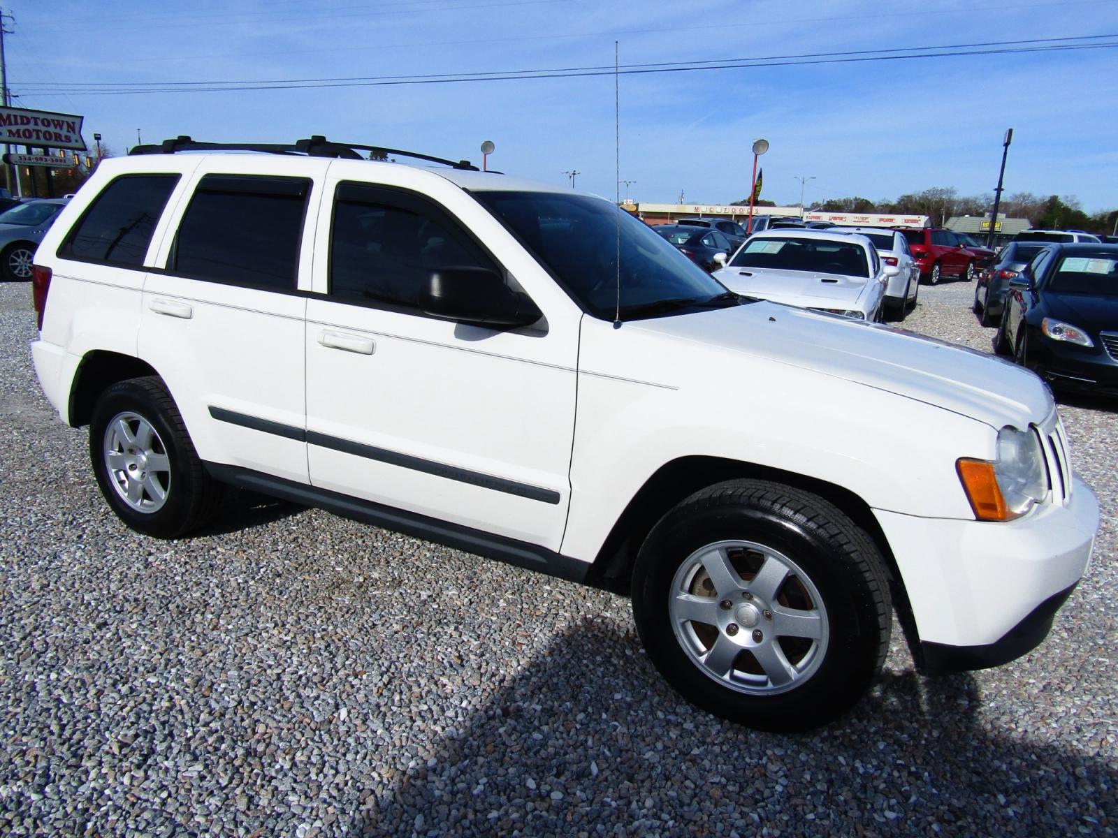 2009 WHITE Jeep Grand Cherokee (1J8GS48KX9C) , Automatic transmission, located at 15016 S Hwy 231, Midland City, AL, 36350, (334) 983-3001, 31.306210, -85.495277 - Photo #0